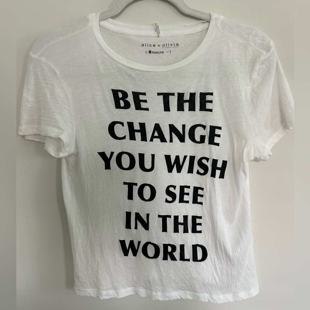Alice and Olivia “Be the Change you wish to see in the World” white graphic tee!